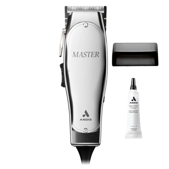 Silver hair clipper with accessories including a plastic cover and lubricant tube.