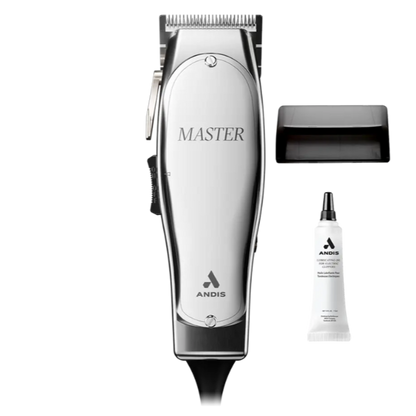 Silver hair clipper with accessories including a plastic cover and lubricant tube.