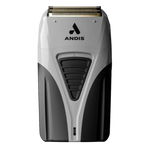Electric shaver with gold foil head.